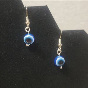 Silver Wire and Blue Evil Eye Bead Earrings